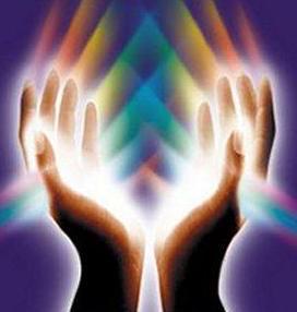 Hands in a spiritual healing setting